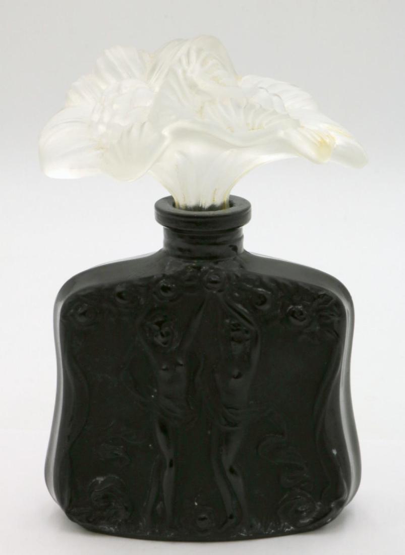 Art Nouveau Clear & Black Art Glass Perfume Bottle: Art Nouveau Clear & Black Art Glass Perfume Bottle. Depicting nudes and floral design. Measures - 5 3/4" high x 3 3/4" wide.