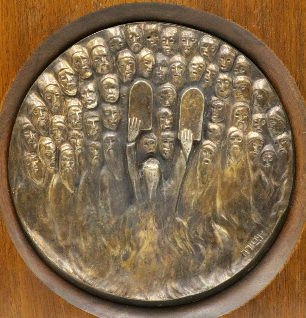 Judaica Framed Bronze Plaque: Judaica Framed Bronze Plaque. Depicting Moses with tablets. Measures - 8" diameter (plaque) with frame - 13" square.