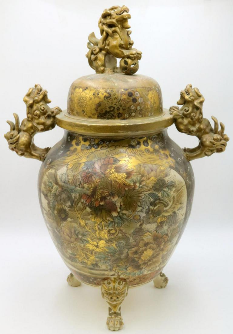 Antique Japanese Satsuma Porcelain Urn: Antique Japanese Satsuma Porcelain Urn, hand painted with three foo dogs. This piece is as is, has been repaired. Measures - 19" high x 13 1/2" wide.