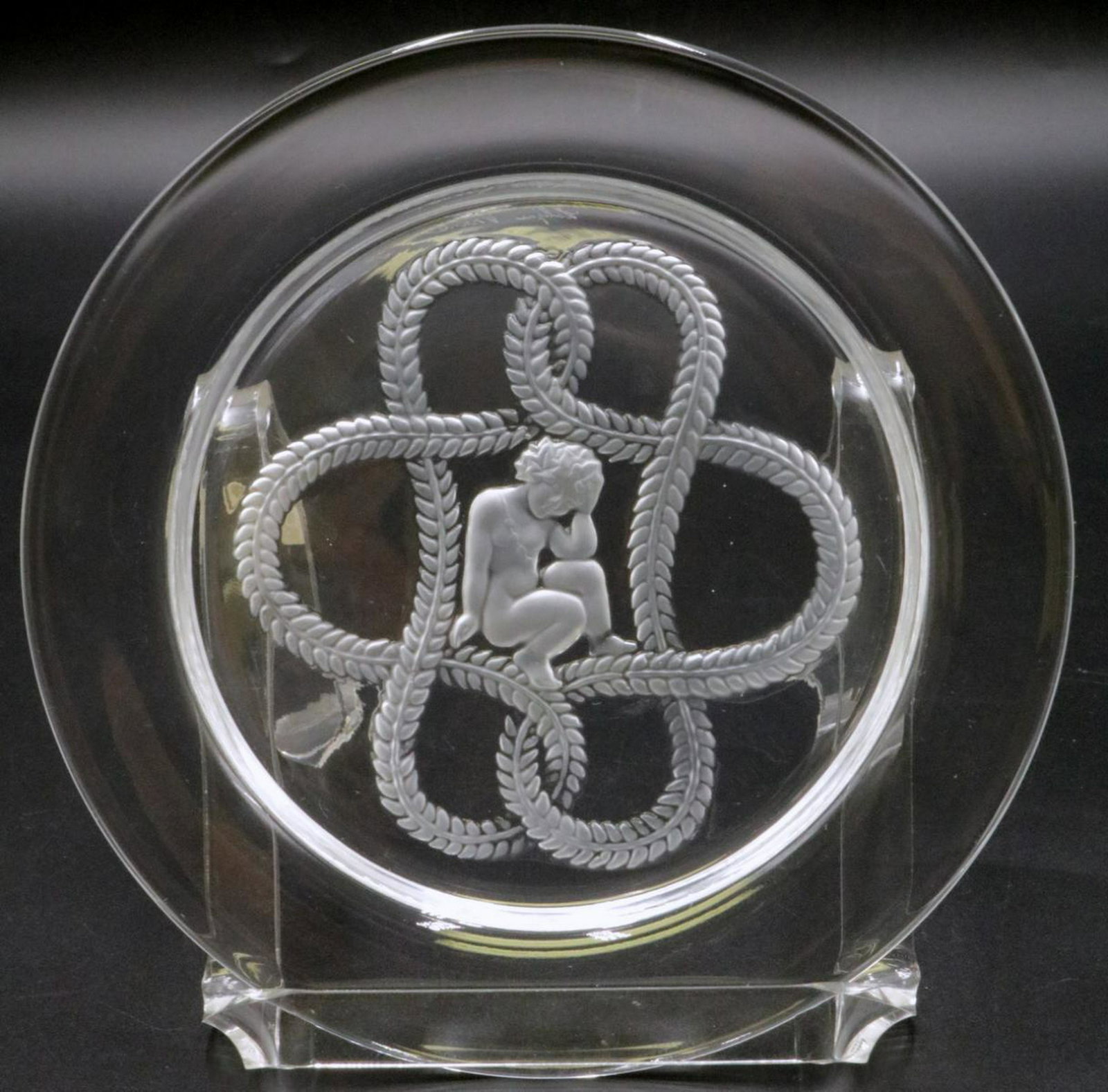 18 Lalique Intaglio Cherub Crystal Dessert Plates: 18 Pc. Lalique France Intaglio Cherub Crystal Dessert Plates. Measures - 6 3/8" diameter.