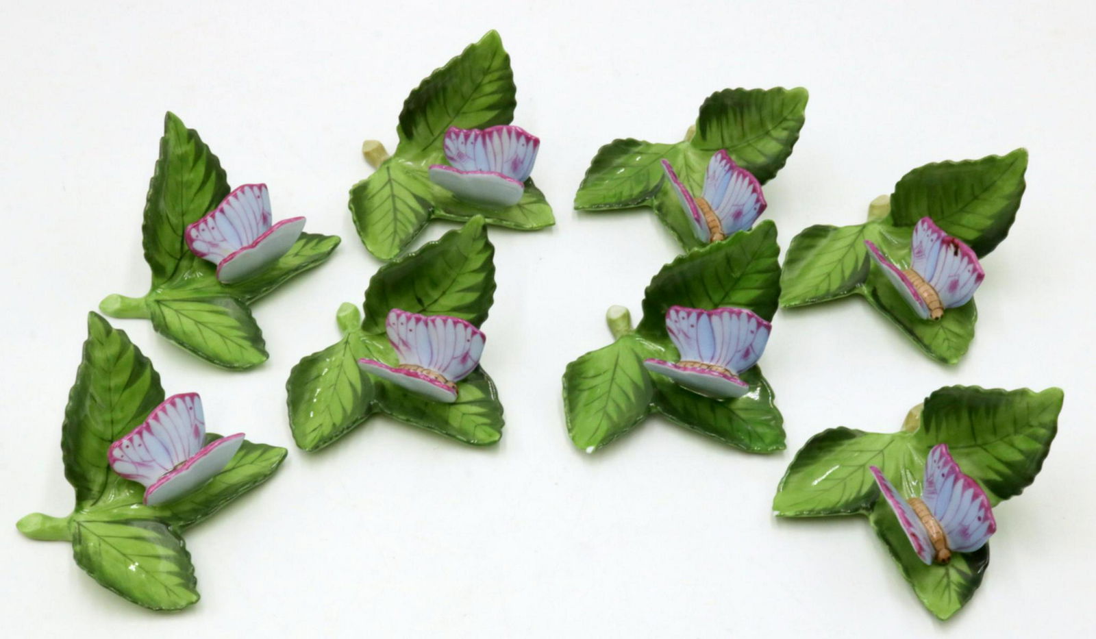 8 Pc. Herend Porcelain Butterflies Place Card Holders: 8 Pc. Herend Porcelain Butterflies Place Card Holders. Measures - 3" wide.