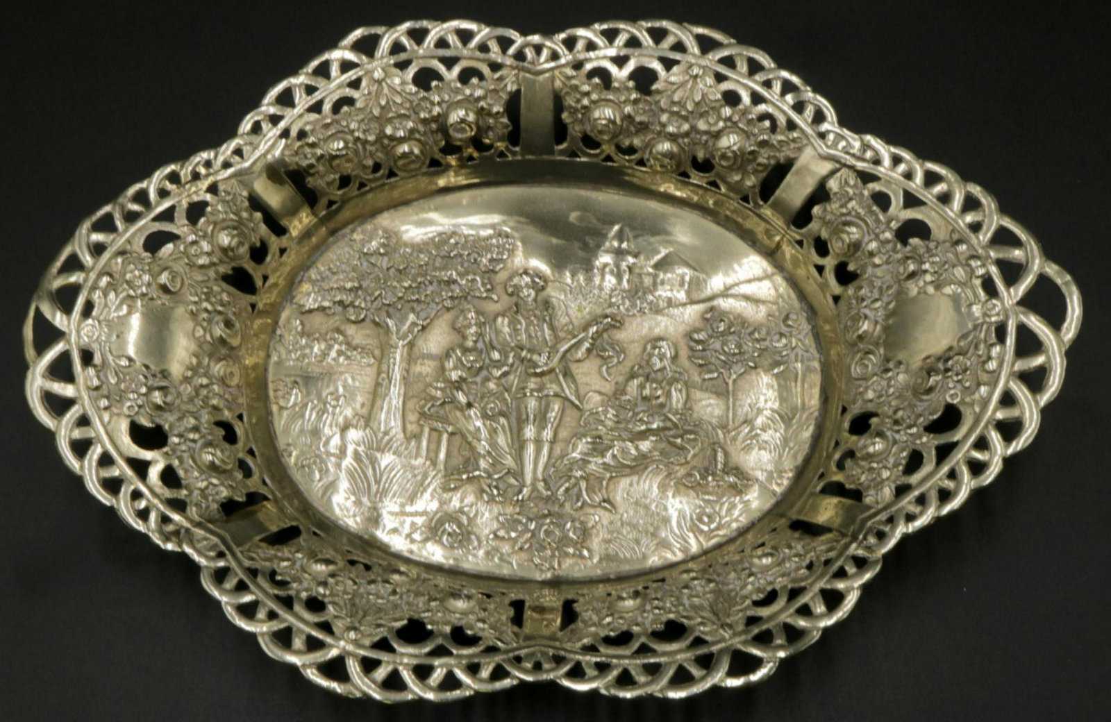German 800 Silver Pierced Dish: German 800 Silver Pierced Dish. Measures - 7 1/8" long x 5 1/8" wide. Weight - 132.2 grams.
