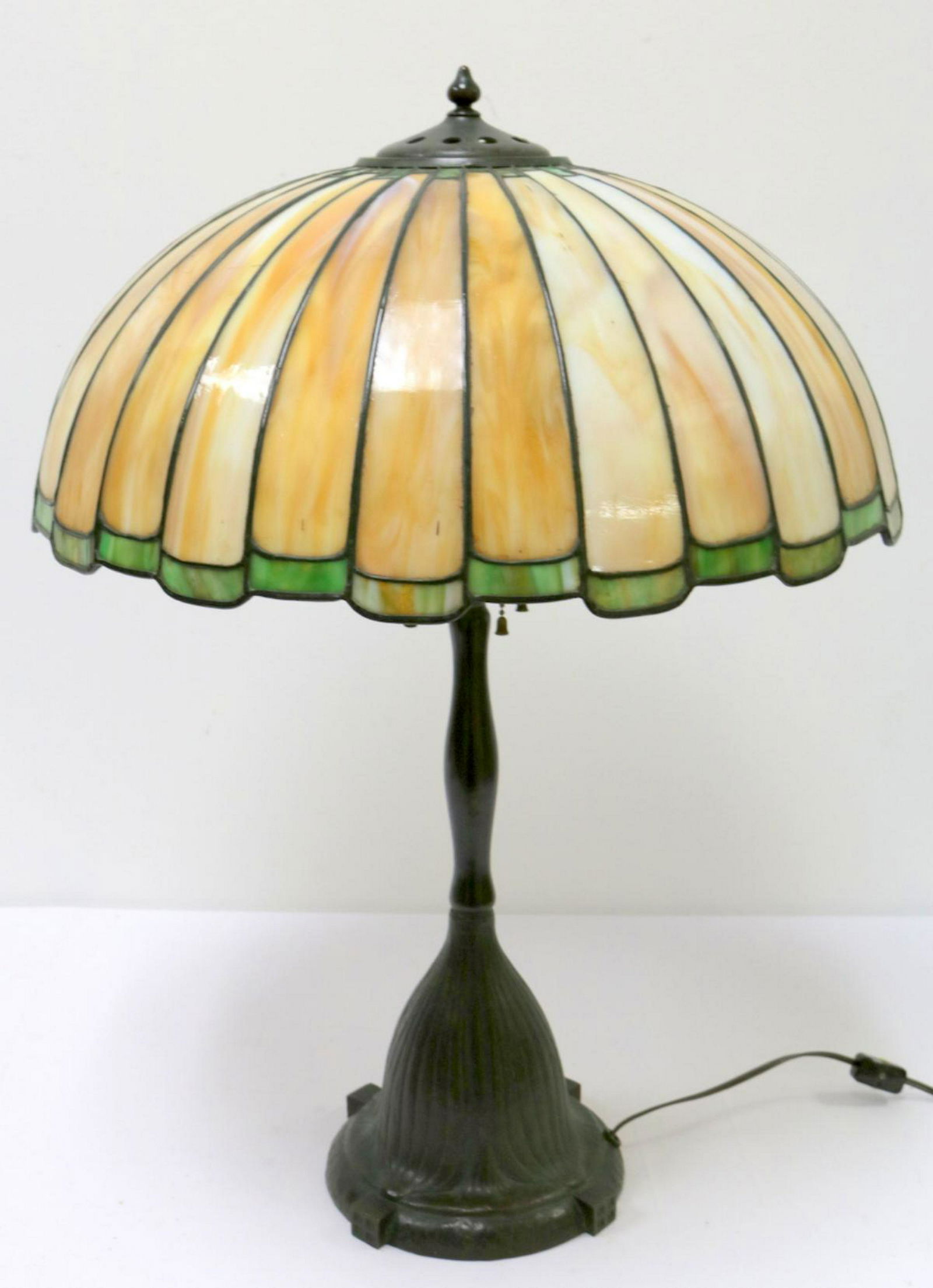 Handel Art Nouveau Stained Glass & Bronze Lamp: Handel Art Nouveau Stained Glass Dome & Bronze Lamp. Please note - shade has some damage. Measures - 26" high x 18 1/2" diameter. Signed Handel under base.