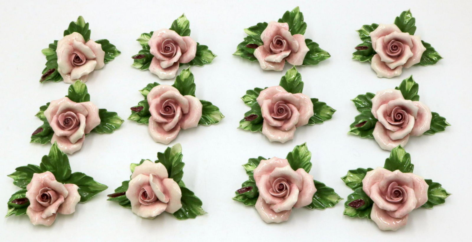 12 Pc. Capodimonte Porcelain Floral Place Card Holders: 12 Pc. Capodimonte Porcelain Floral Place Card Holders. Measures - 3 1/4" wide.