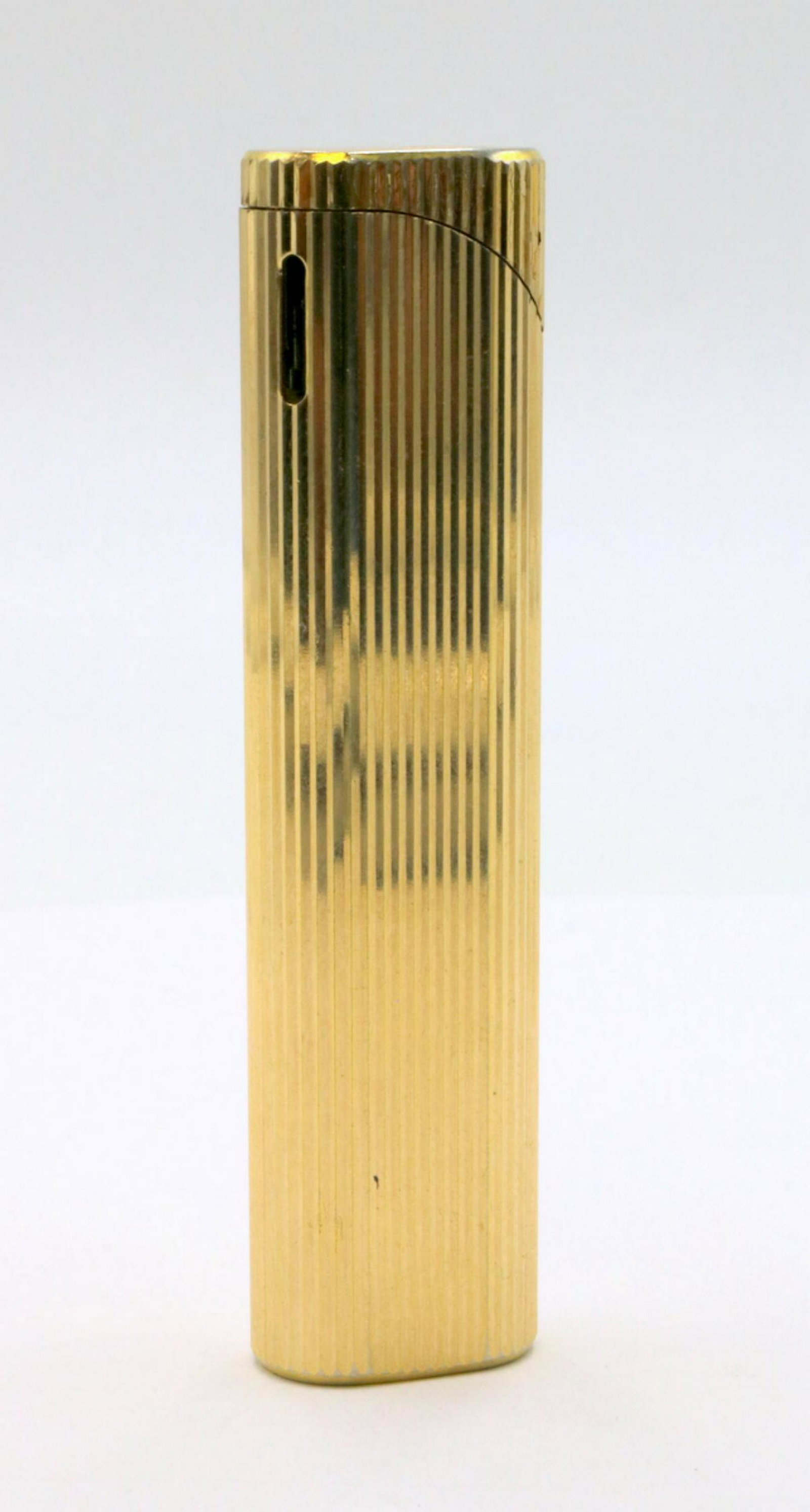 Vintage Tiffany & Co. Gold Tone Lighter: Vintage Tiffany & Co. Gold Tone Lighter. Measures - 3" long.