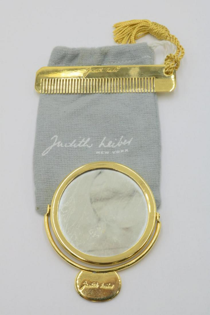 Judith Leiber Gold Tone Mirror & Comb: Judith Leiber Gold Tone Mirror & Comb, with original pouch. Comb - 3 1/2" long, mirror - 3 1/4" long.