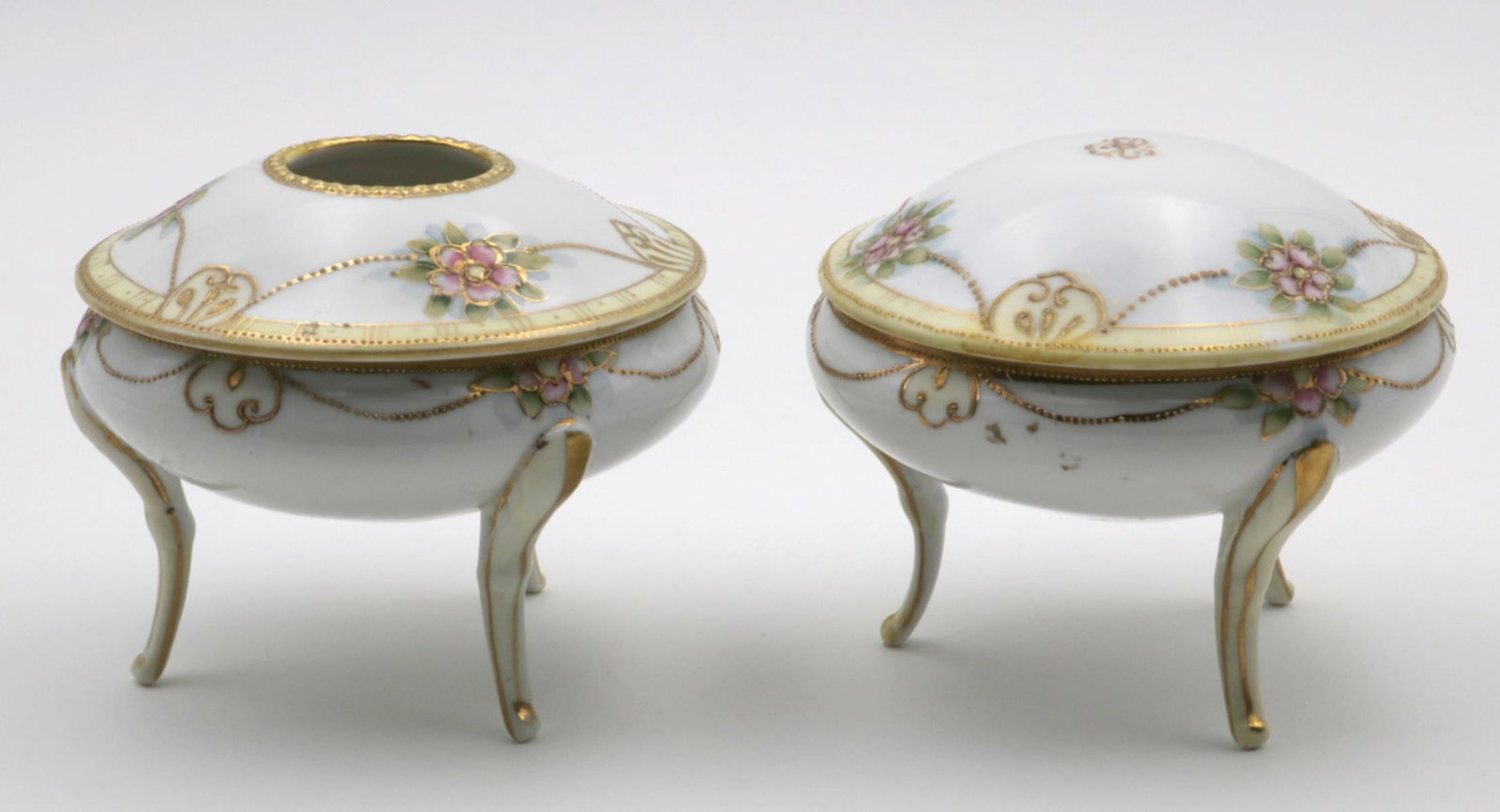 Nippon Hand Painted Porcelain Vanity Set: Nippon Hand Painted Porcelain Vanity Set. One hair receiver, and one powder jar. Measures - 4" high x 4 1/4" diameter. This lot is as is.