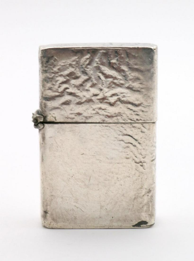 Vintage Tiffany & Co. Sterling Lighter: Vintage Tiffany & Co. Sterling Silver Lighter. Measures - 2 1/4" high. Weight - 63.5 grams.