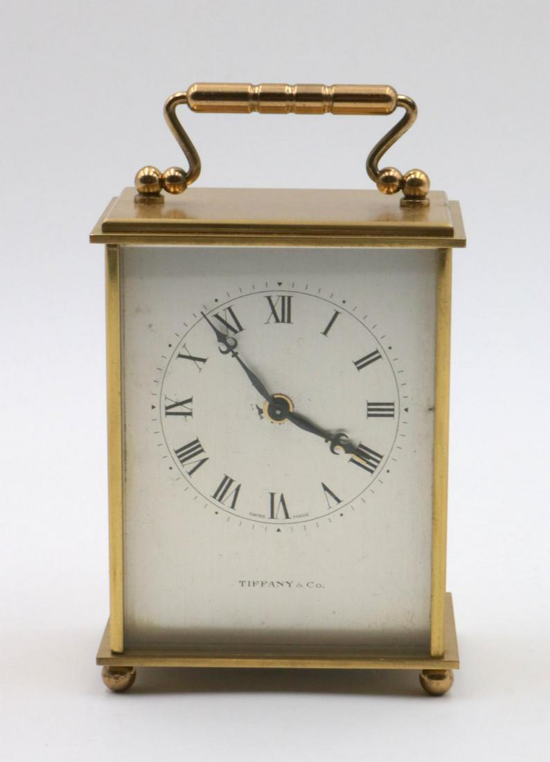 Vintage Tiffany & Co. Alarm Desk Clock: Vintage Tiffany & Co. Alarm Desk 15 Jewels Clock. Measures - 4 1/2" high with handle x 3" wide.