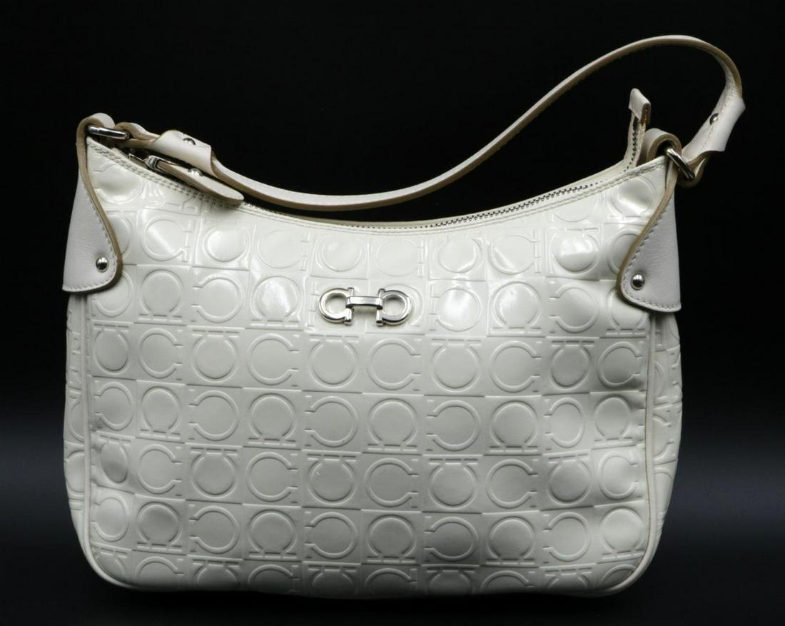 Salvatore Ferragamo Cream Leather Purse: Salvatore Ferragamo Cream Leather Purse. Measures - 8" high x 11" wide without strap.