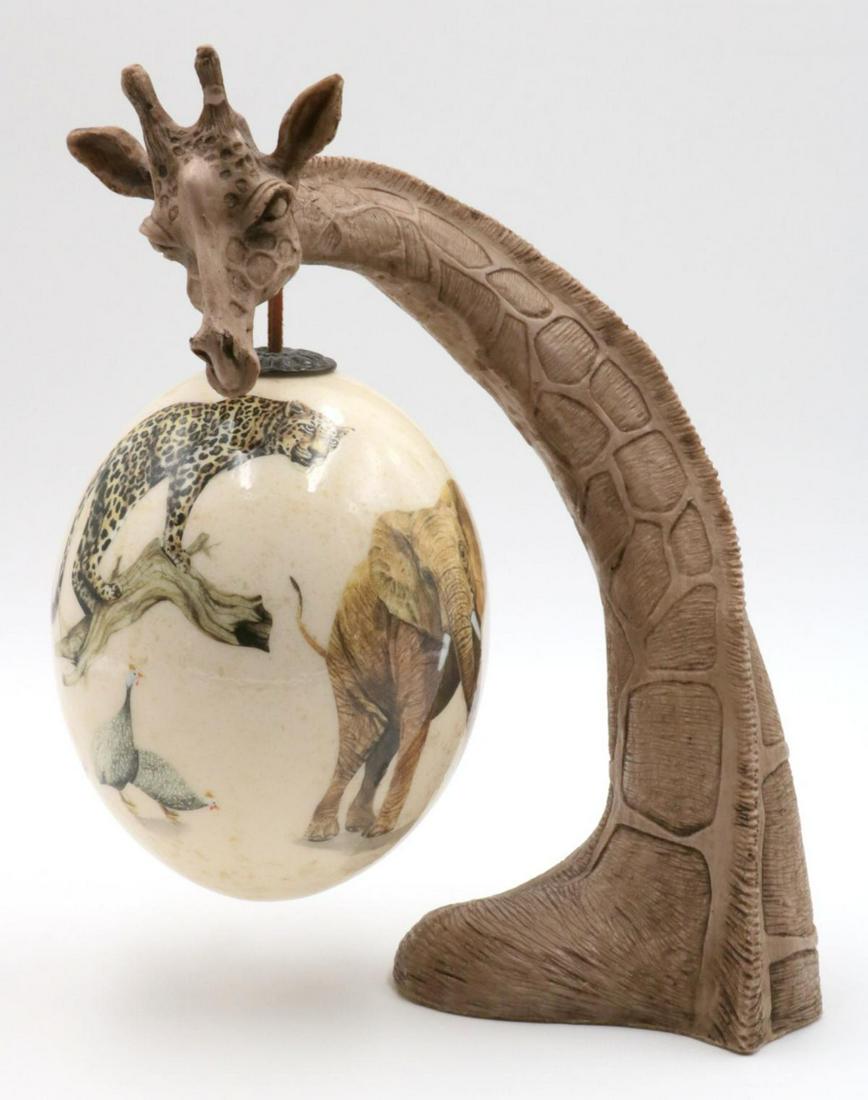 Sherry Rowe Safari Giraffe, Ostrich Egg Sculpture: Sherry Rowe Safari Giraffe, Ostrich Egg Sculpture. Depicting cheetah, lion, elephant, buffalo and rhino. Measures - 11 1/2" high.