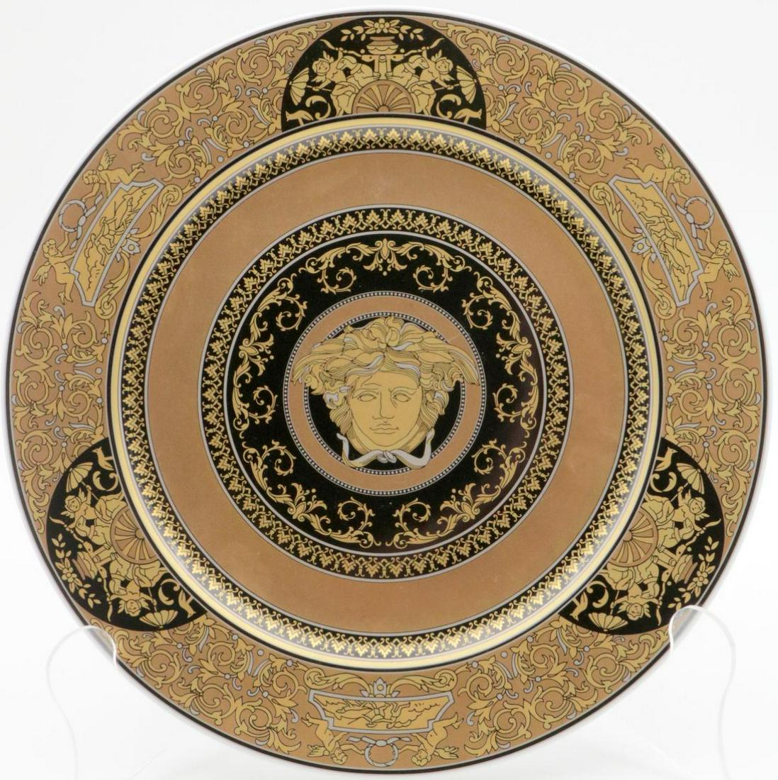 Rosenthal Versace "Arcadia 2003" Porcelain Charger: Rosenthal Versace "Arcadia 2003" Porcelain Charger. Depicting medusa head. Measures - 12 1/4" diameter.
