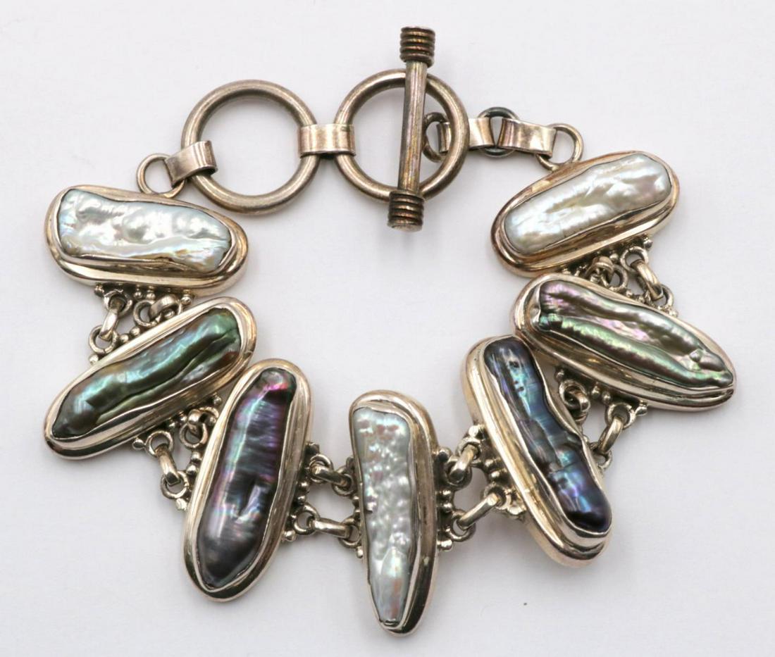 Sterling Silver & Abalone Bracelet: Sterling Silver & Abalone Bracelet. Measures - 8" long. Weight - 57.8 grams.