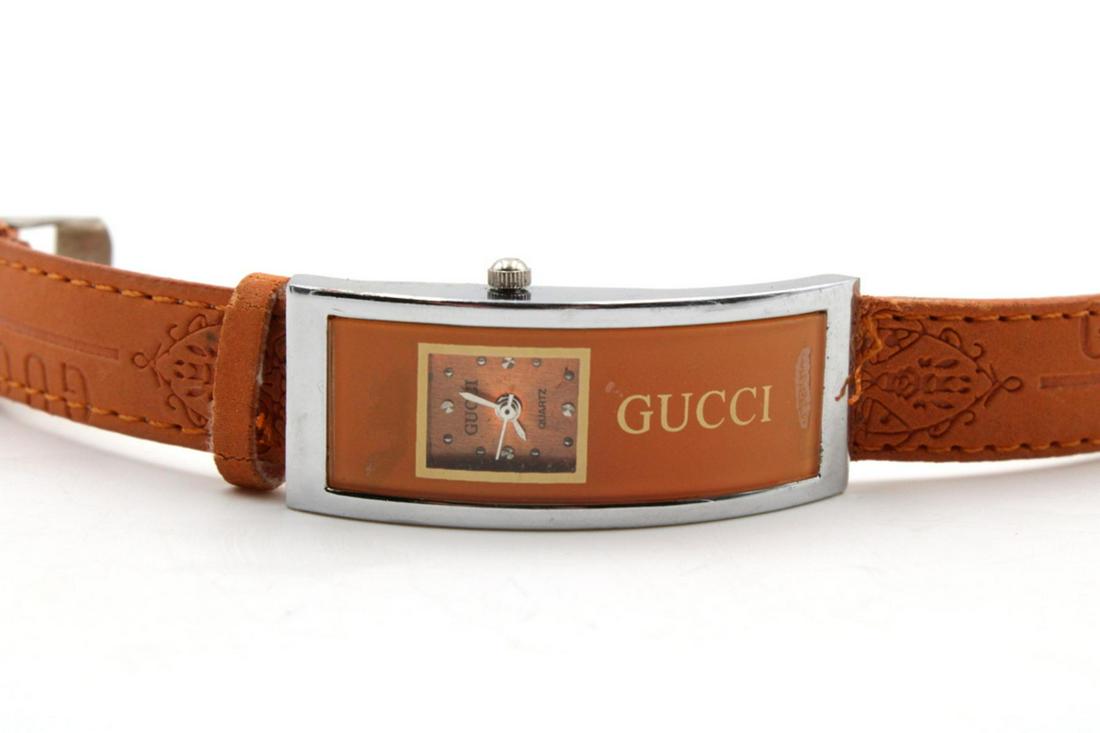 Gucci Orange Leather Band Watch: Gucci Orange Leather Band Watch. Measures - 8" long.