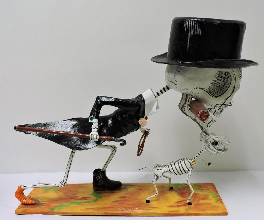 David Linares (Mexican, b. 1963) Folk Art Sculpture: David Linares (Mexican, b. 1963) "Day of the Dead" Paper Mache Folk Art Sculpture. Depicting a well dressed skeleton chasing a skeleton dog. Signed on top and bottom of base. Measures -23 1/2" high x 