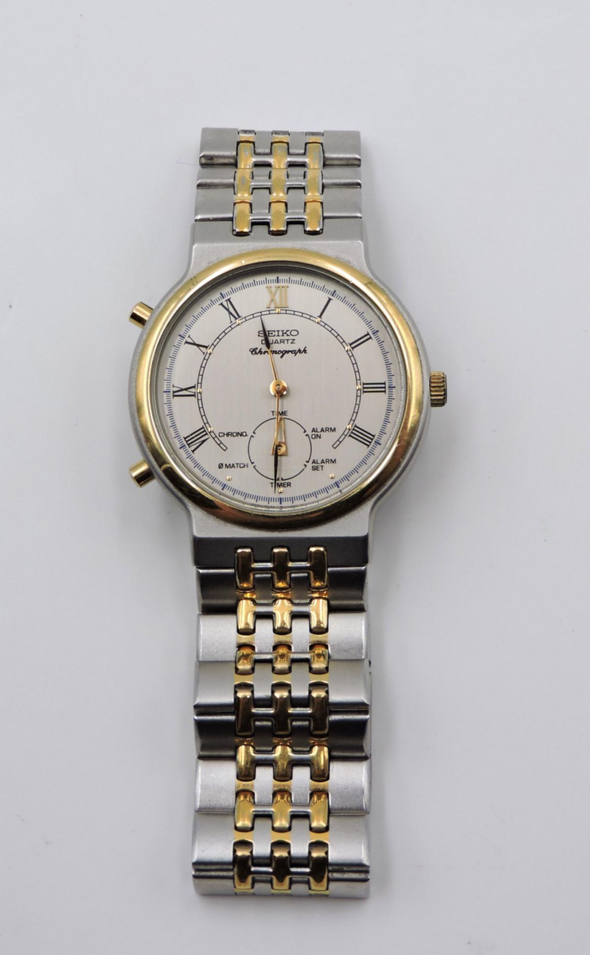 Seiko Two-Tone Stainless Chronograph Watch: Seiko Two-Tone Stainless Chronograph Watch. Measures - 7 1/2" long.