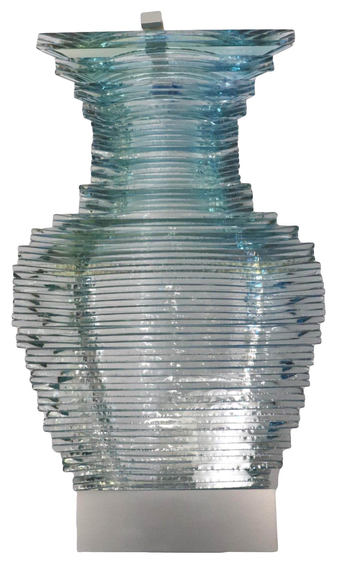 Sidney Hutter "Quasi Modern #57" Glass Sculpture: Sidney Hutter (American, b. 1954) "Quasi Modern #57" Art Glass Wall Sculpture. Dated June 1999. Beautiful laminated glass with blue dye and aluminum hardware. Measures - 18 1/4" high x 10 1/2" wide. O