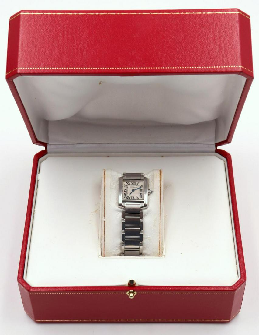 Cartier "Tank" Stainless Steel Watch: Cartier "Tank" Stainless Steel Ladies Watch. With original box and book.