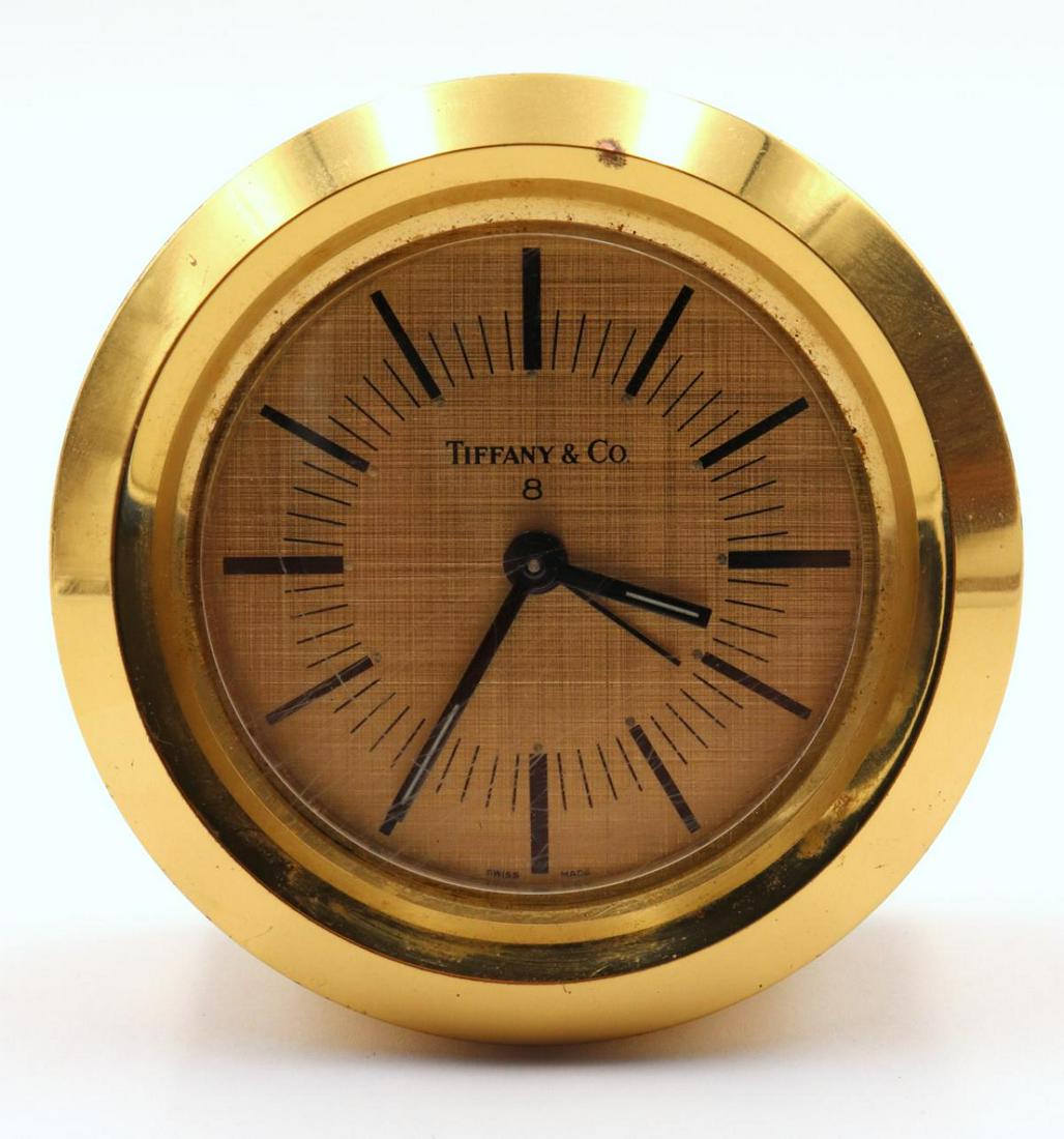 Vintage Tiffany Heavy Brass Mechanical Swiss Clock: Vintage Tiffany Heavy Brass Mechanical Swiss Movement Desk Clock. Measures - 3 1/4" high.