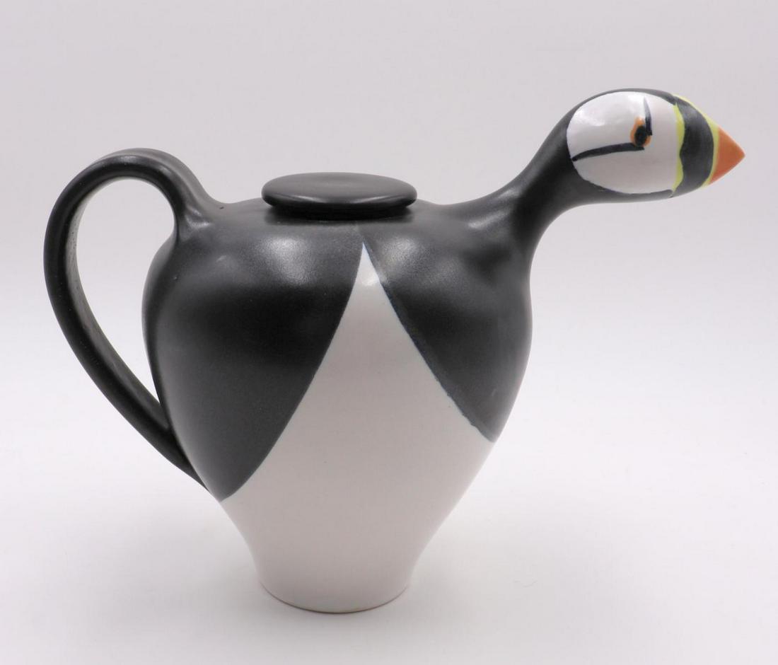 Signed Penguin Pottery Pitcher: Signed Penguin Pottery Pitcher. Measures - 9 1/2" high x 11 3/4" wide.