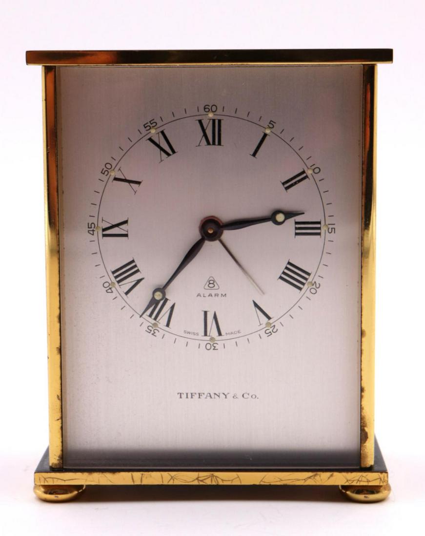 Vintage Tiffany & Co. Brass Alarm Desk Clock: Vintage Tiffany & Co. Brass Alarm Desk Clock. Measures approx. - 3 1/2" high x 2 7/8" wide.