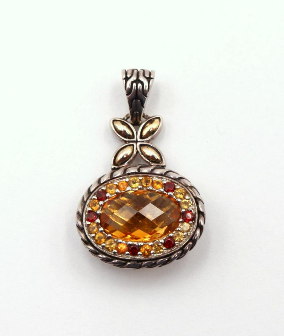 John Hardy 18Kt & Sterling Citrine Pendant: John Hardy 18Kt Yellow Gold & Sterling Silver Diamond Cut Citrine Pendant. Weight - 7.1 grams.