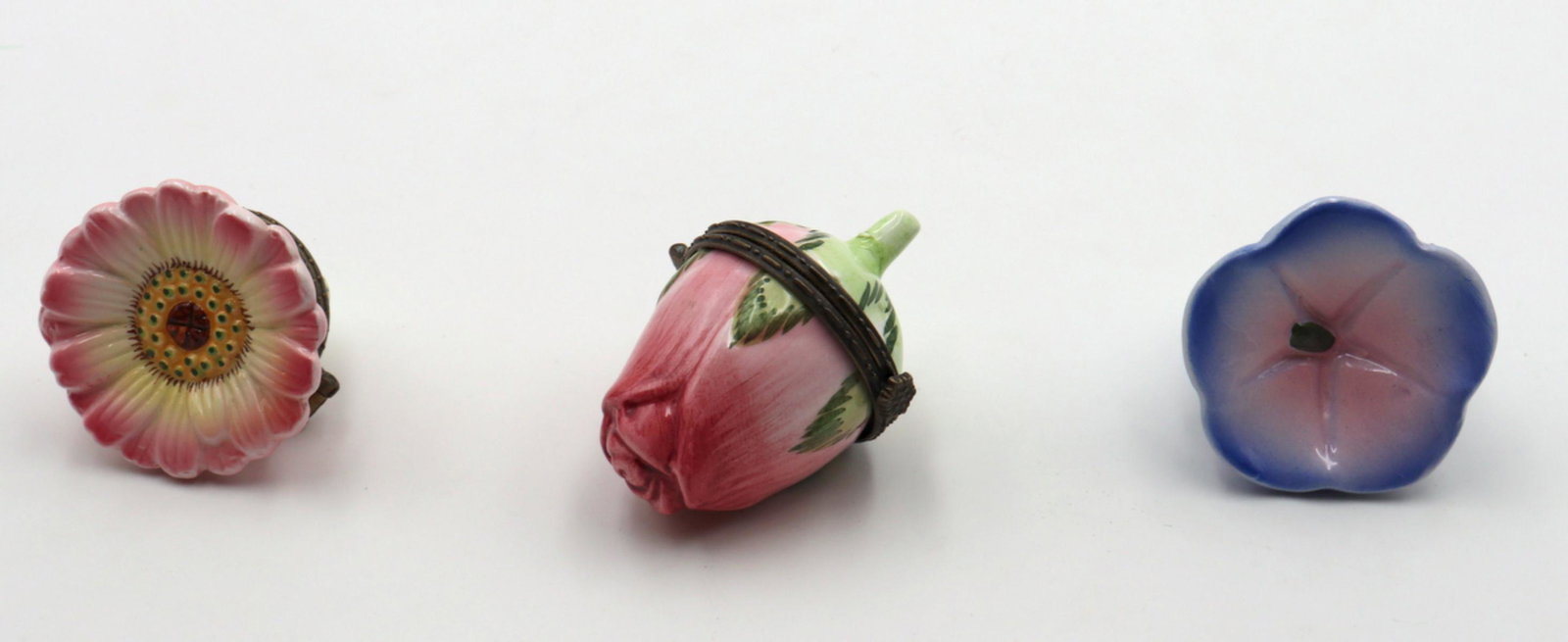 3 Pc. Hand Painted Floral Porcelain Pill Boxes: 3 Pc. Hand Painted Floral Porcelain Pill Boxes. Measures - 2" long.