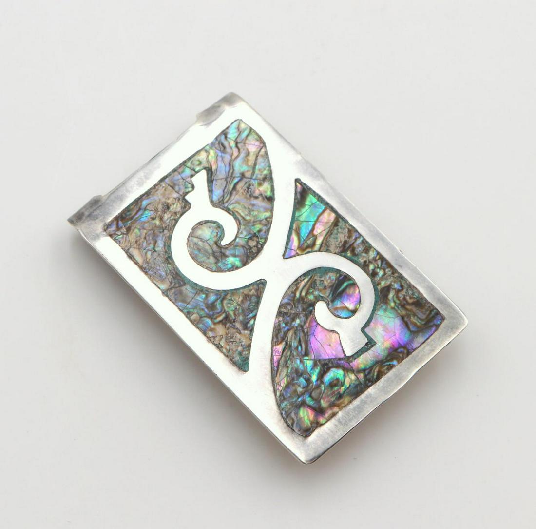 Sterling Silver & Abalone Money Clip: Sterling Silver & Abalone Money Clip. Measures approx. - 1 7/8" long. Weight - 11 grams.