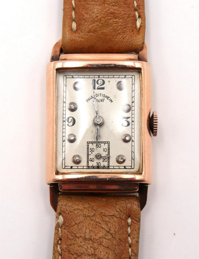 Art Deco Paul Ditisheim 14Kt Rose Gold Watch: Art Deco Paul Ditisheim 14Kt Rose Gold Tank Watch. With diamond dial. With brown leather strap. Measures approx. - 8 1/2" long.