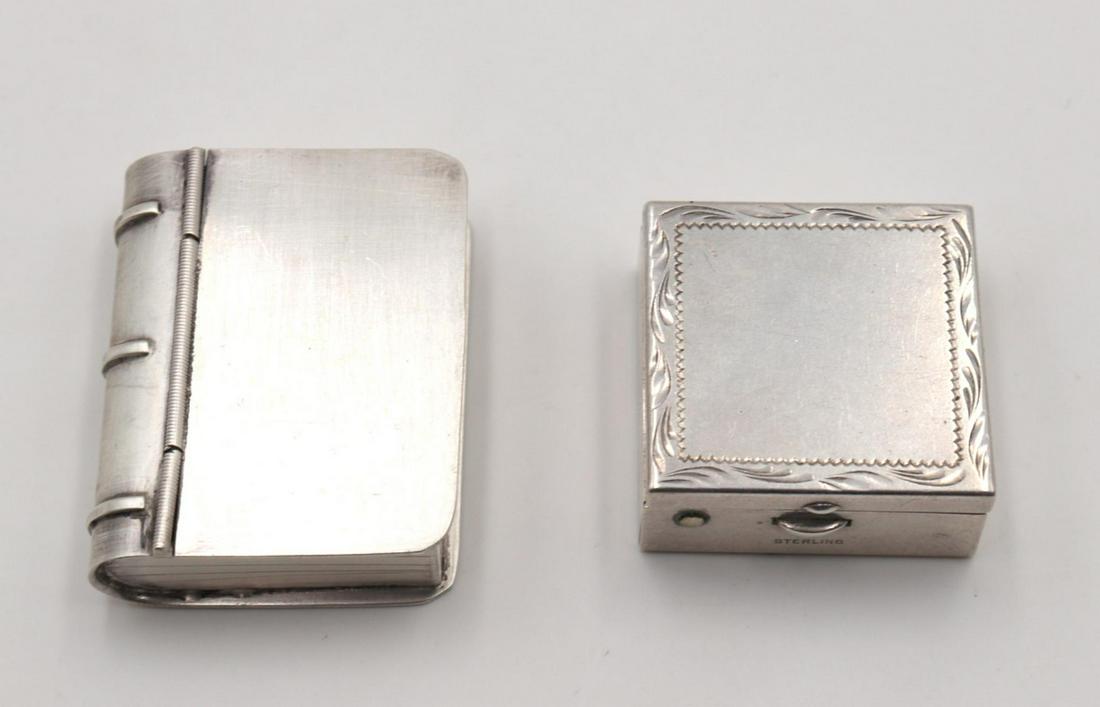 Lot of 2 Sterling Silver Pill Boxes: Lot of 2 Sterling Silver Pill Boxes. Measures approx. - 1 1/4" - 1 3/4" long. Weight - 54.4 grams.
