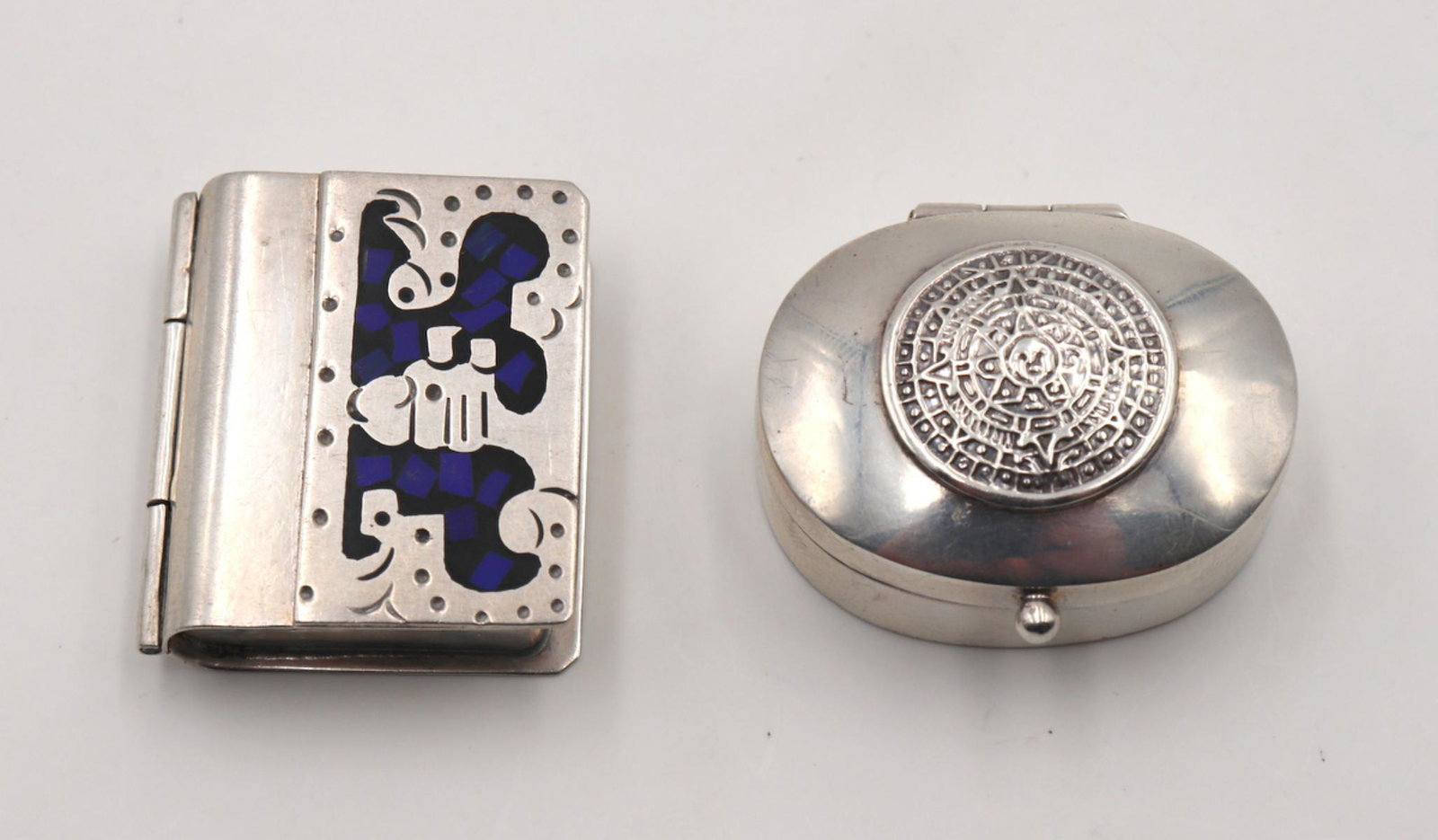 2 Pc. Taxco Sterling Silver Pill Boxes: 2 Pc. Taxco Sterling Silver Pill Boxes. Measures approx. - 1 1/2" long. Weight - 53.1 grams.