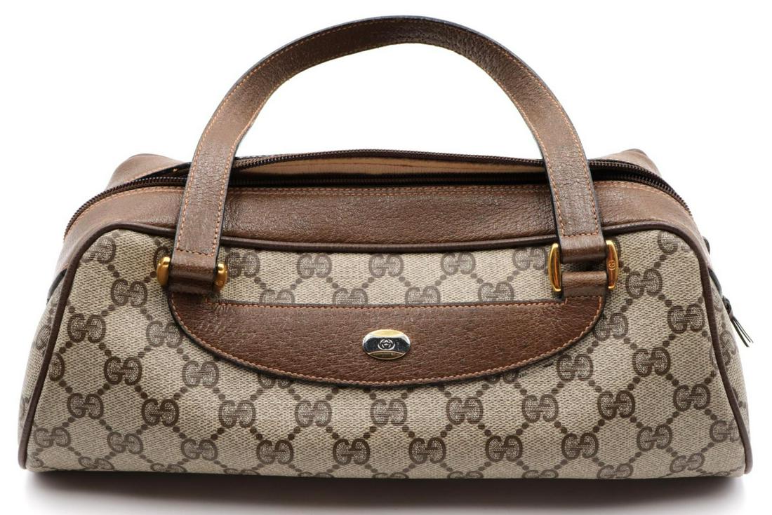 Vintage Gucci Monogram Canvas Purse: Vintage Gucci Monogram Canvas Purse. Measures - 5 1/2" high (without handles) x 12 1/2" long.