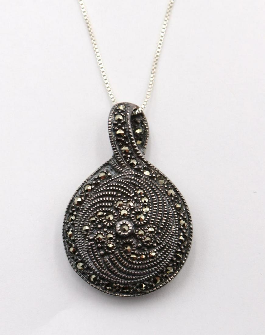 Reversible Sterling Onyx & Marcasite Pendant w/: Reversible Sterling Silver Onyx & Marcasite Pendant w/ Necklace. Necklace measures - 17" long. Weight - 14.7 grams.