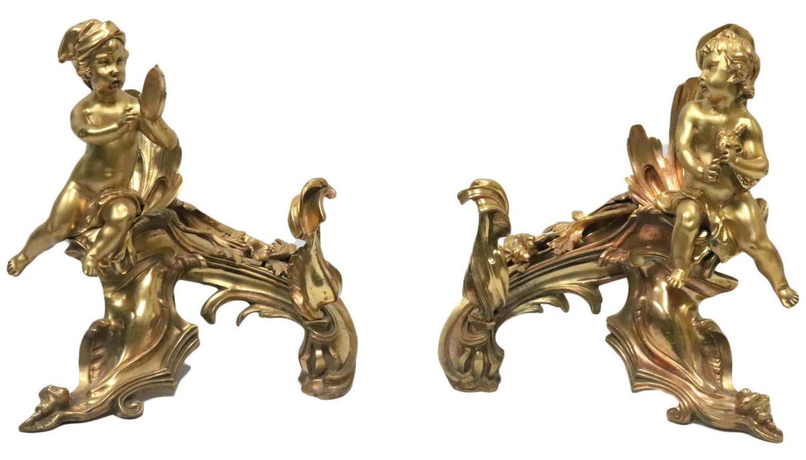 Auguste Morisot French Dore Bronze Chenets: Antique, 19th Century Auguste Morisot (French 1857-1951) French Dore Bronze Chenets/Andirons. Beautiful detail, depicting cherubs with instruments. Measures approx. - 14 3/4" high x 13" wide.