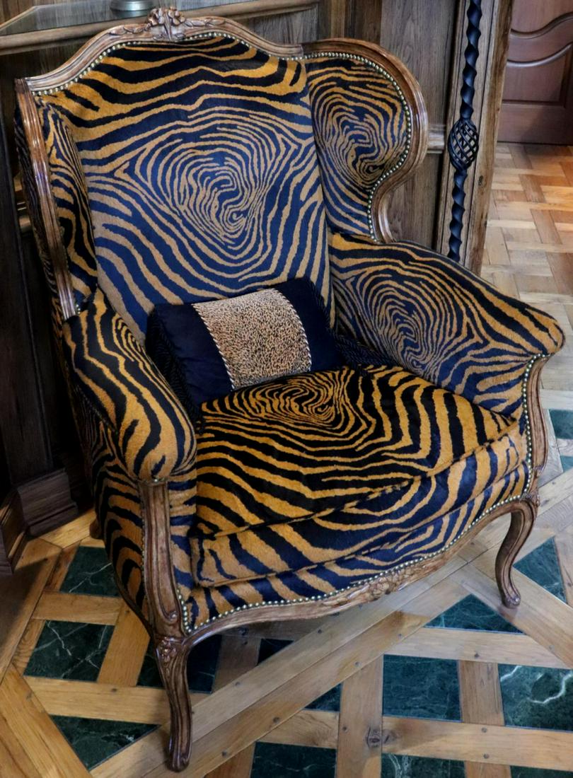 Minton Spidell Upholstered Tiger Print Lounge Chair: Minton Spidell Upholstered Tiger Print Lounge Chair. Measures approx. - 46" high x 34 1/2" wide x 39" deep.
