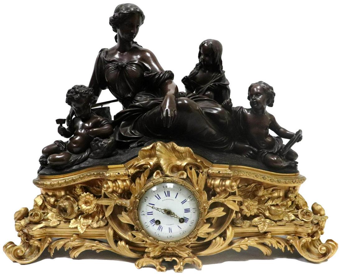 19th C. Raingo Fres Bronze Mantel Clock: Antique 19th Century, French Raingo Fres Bronze Mantel Clock. Louis XVI style, A fine quality French 19th Century gilded ormolu and patinated bronze clock having bronze patinated mother and three chil