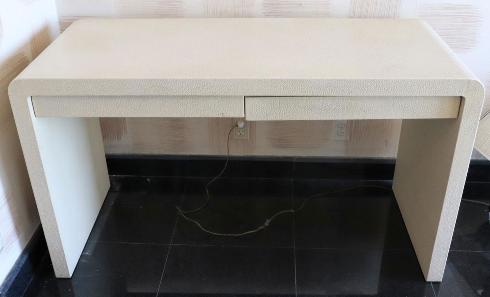 Karl Springer (German 1931-1989) Embossed Leather: Karl Springer (German 1931-1989) Emu-Embossed Leather Waterfall Desk. No visible signature. Measures approx. - 29 1/2" high x 52" long x 22 1/4" deep.