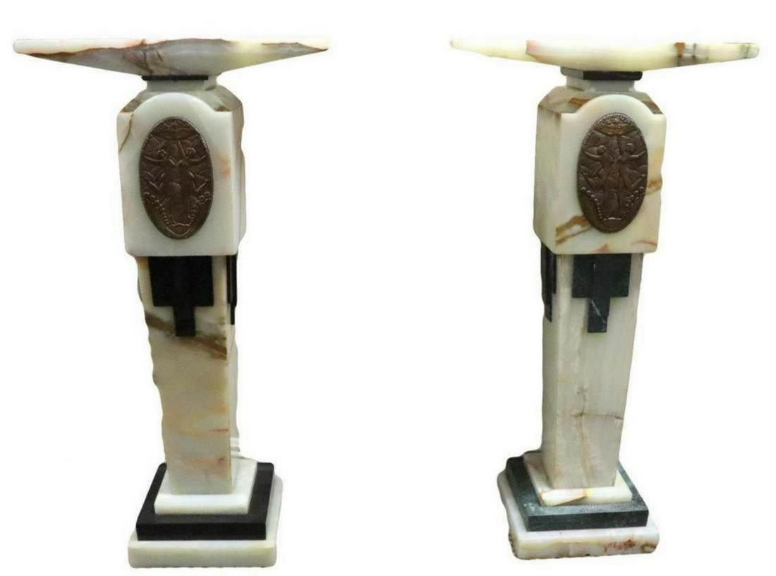 After Chiparus Onyx & Marble Pedestals: Art Deco After Demetre Chiparus Onyx & Marble Pedestals. With bronze medallions. Measures - 41 1/2" high x 22" wide.