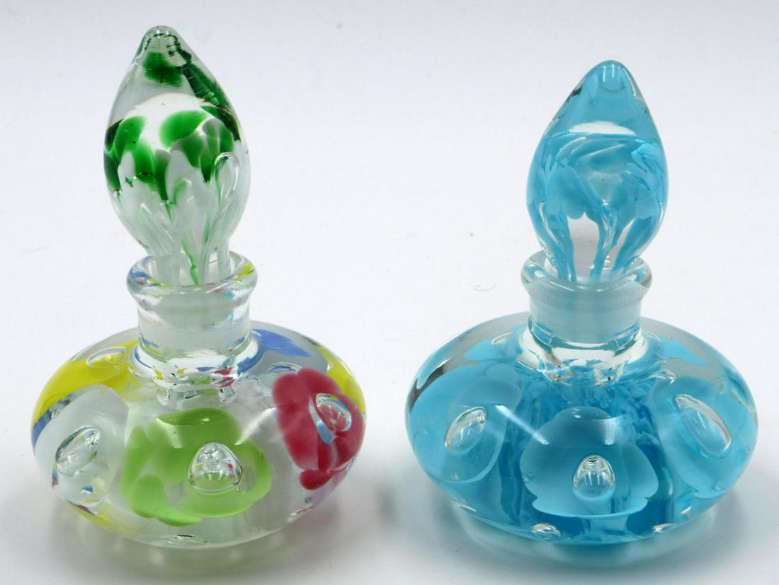 Joe St. Clair Perfume Bottles: Joe St. Clair Perfume Bottles. Measures approx. - 5 1/2" - 6" high.