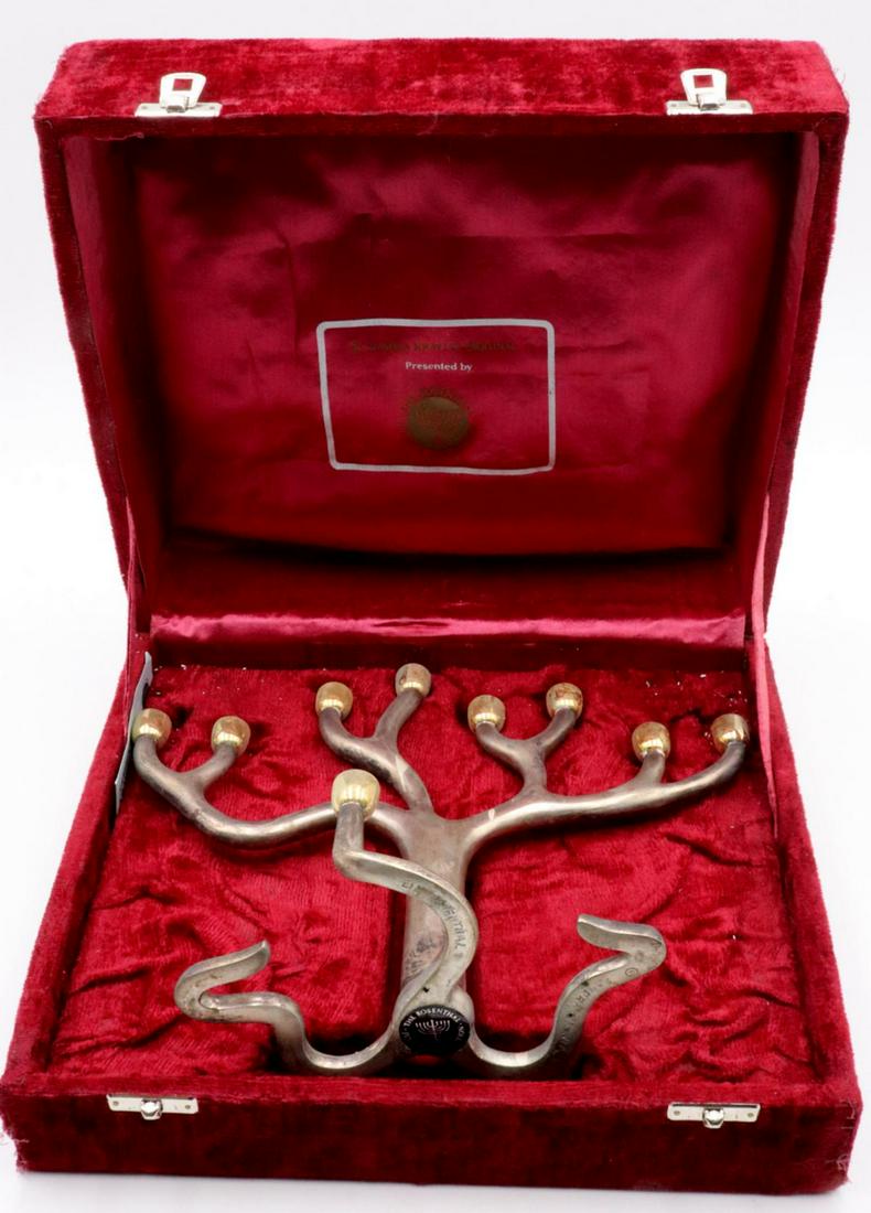 Sandra Kravitz Silver Plated Menorah: Sandra Kravitz Rosenthal Silver Plated Menorah. With original box. Measures approx. - 9' high x 11" wide.