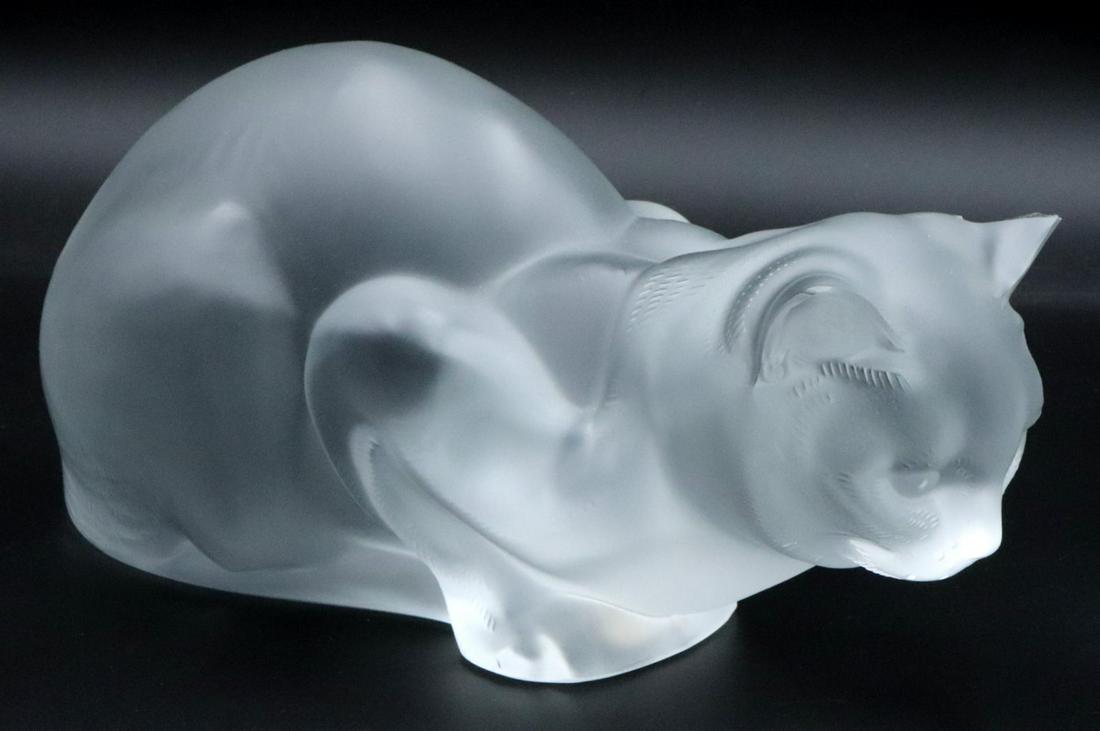 Lalique Crystal Crouching Cat (AS IS): Lalique Crystal Crouching Cat (AS IS). Lalique Crystal Crouching Cat. Measures - 4 3/8" high x 9 1/2" long. Marked Lalique France. Piece is as is, ear is damaged, please see pictures.