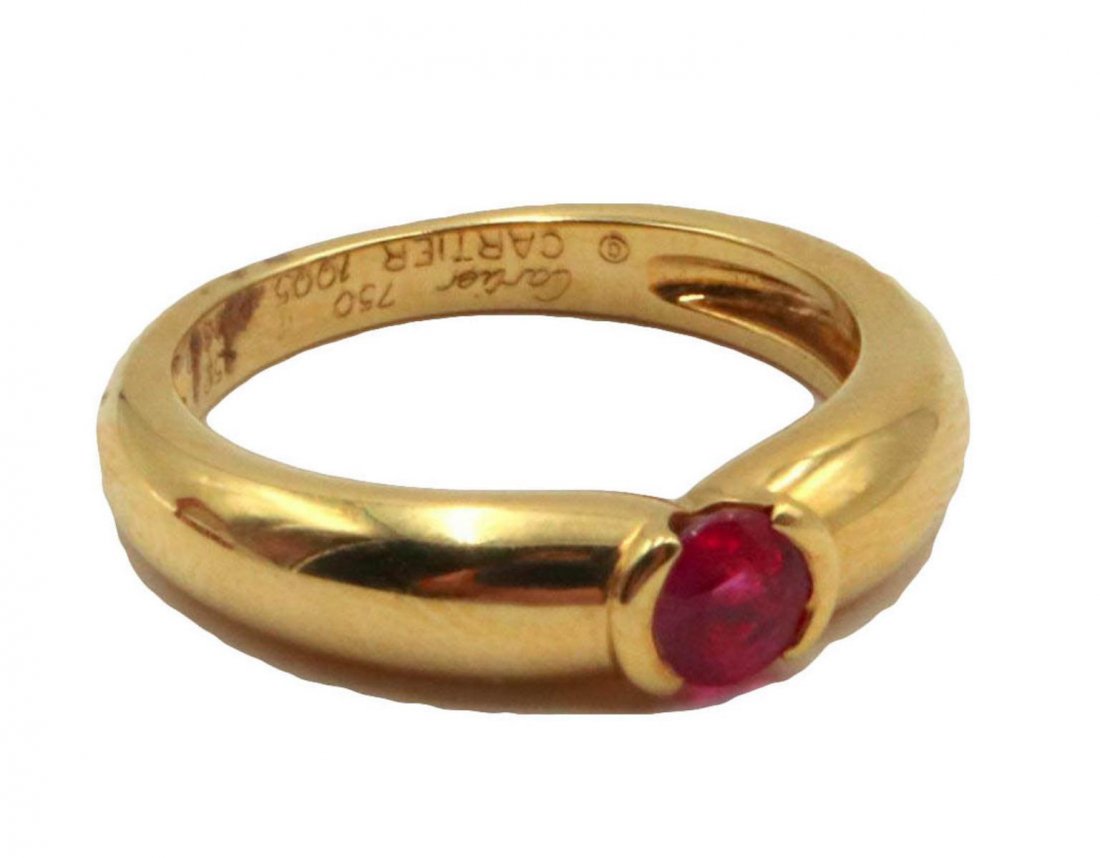 Cartier 18Kt & Ruby Ring: Cartier 18Kt Yellow Gold & Ruby Ring. Circa 1990's. Size - 6. Weight - 4.9 grams.