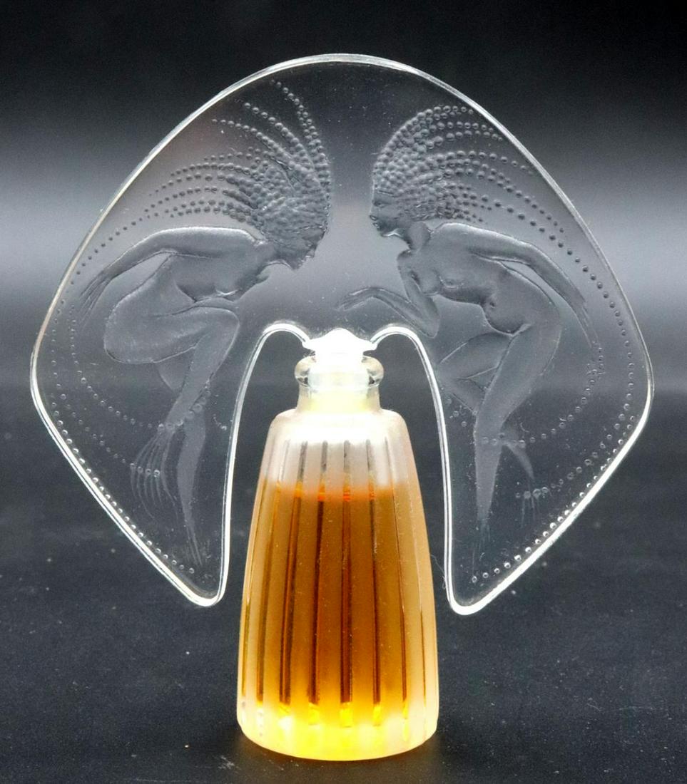 Lalique Miniature Perfume Bottle: Lalique Miniature Perfume Bottle. Measures approx. - 2 7/8" high x 2 5/8" wide.