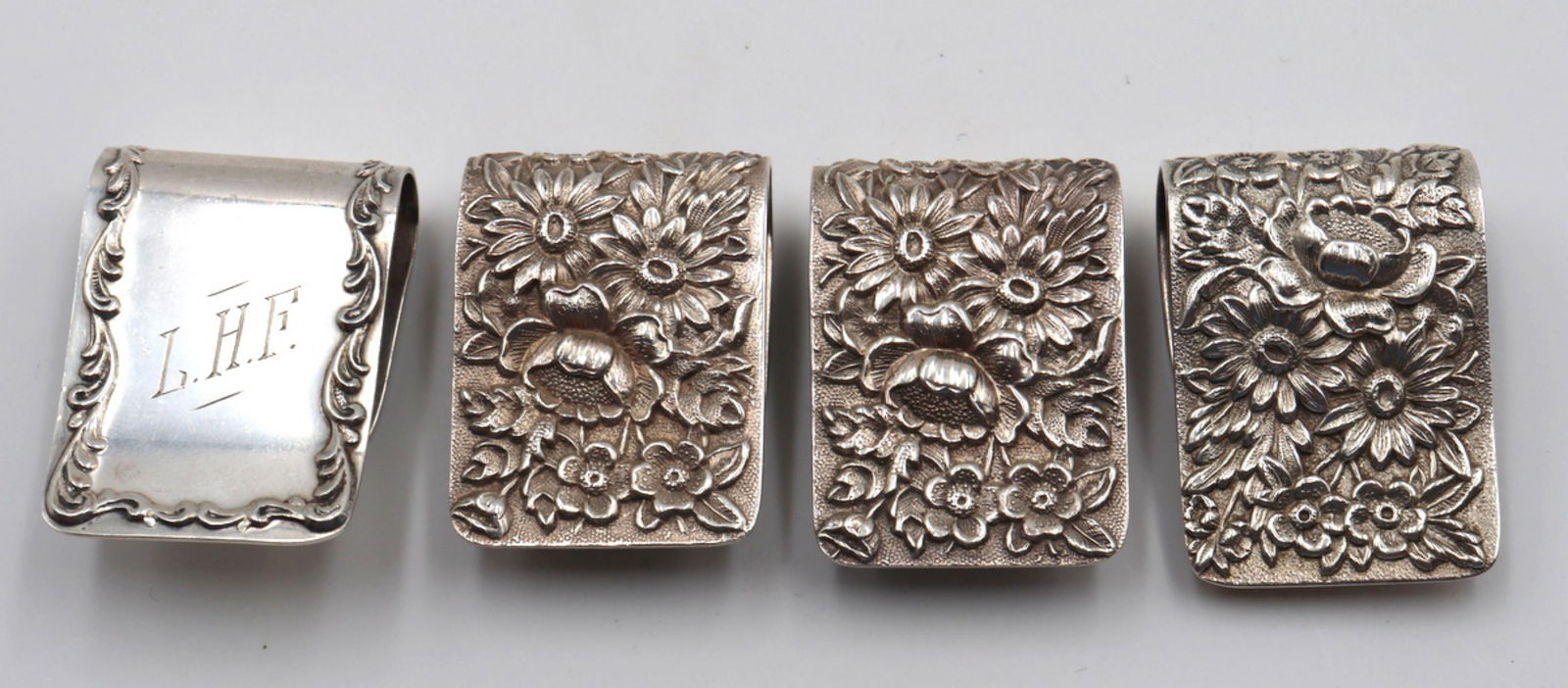 4 Pc. Kirk & Son's Sterling Napkin Clips: 4 Pc. Kirk & Son's Sterling Silver Napkin Clips. Weight - 2.350 troy oz.