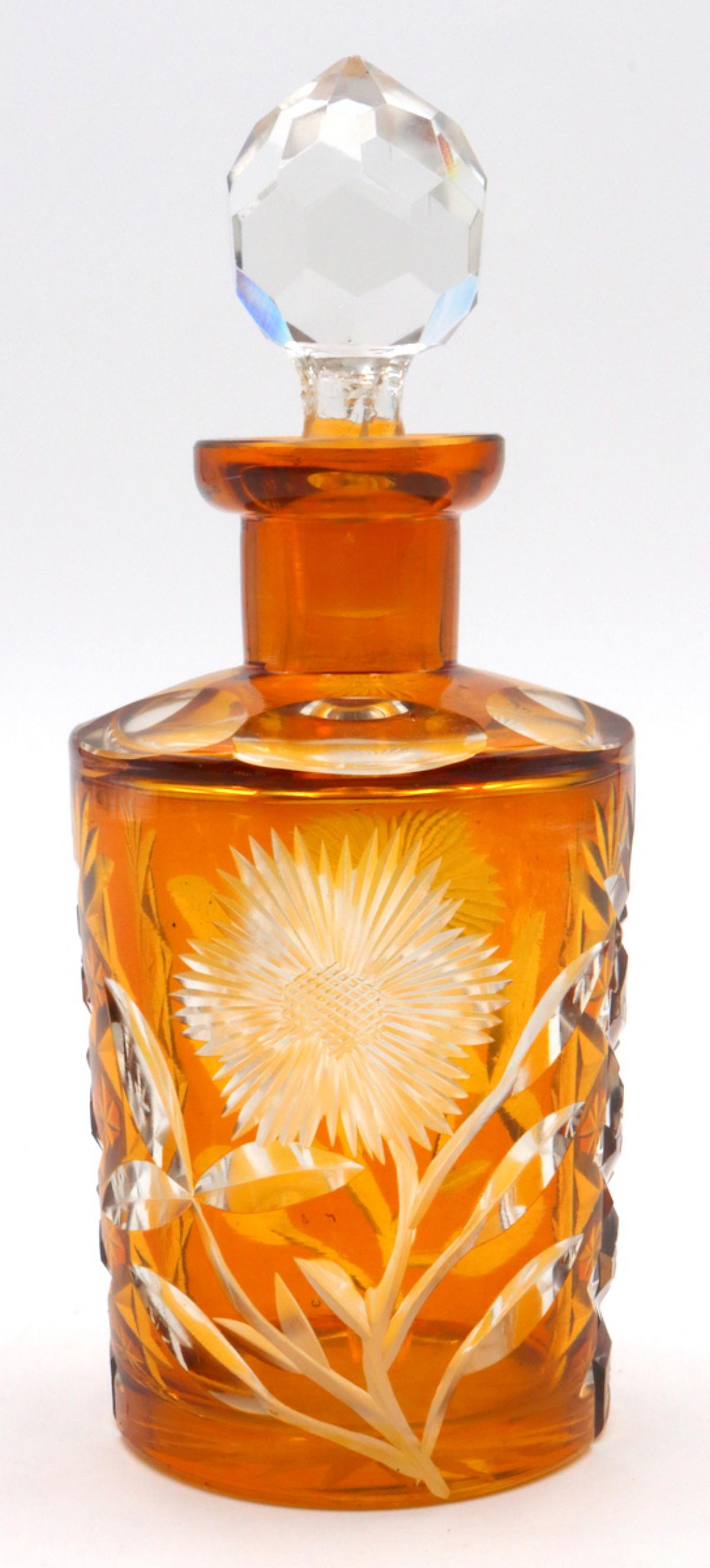 Bohemian Cut Glass Perfume Bottle: Bohemian Cut Glass Perfume Bottle. Measures approx. - 6 1/2" high x 2 3/4" diameter.