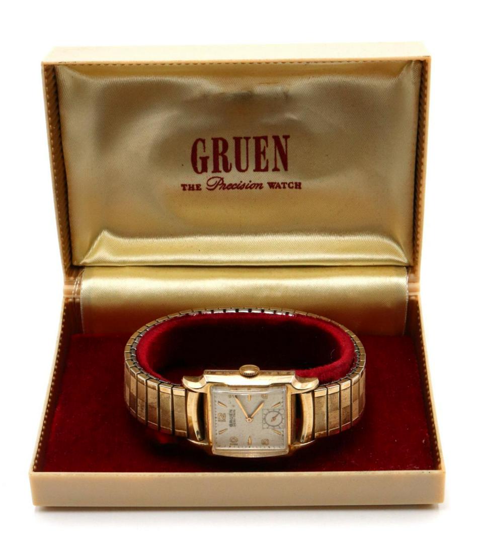 Vintage Gruen 17J Wristwatch: Vintage Gruen 17J Wristwatch. Gold filled top with stainless steel back. Fancy case, curved crystal, excellent running condition. With original box. 415 movement.