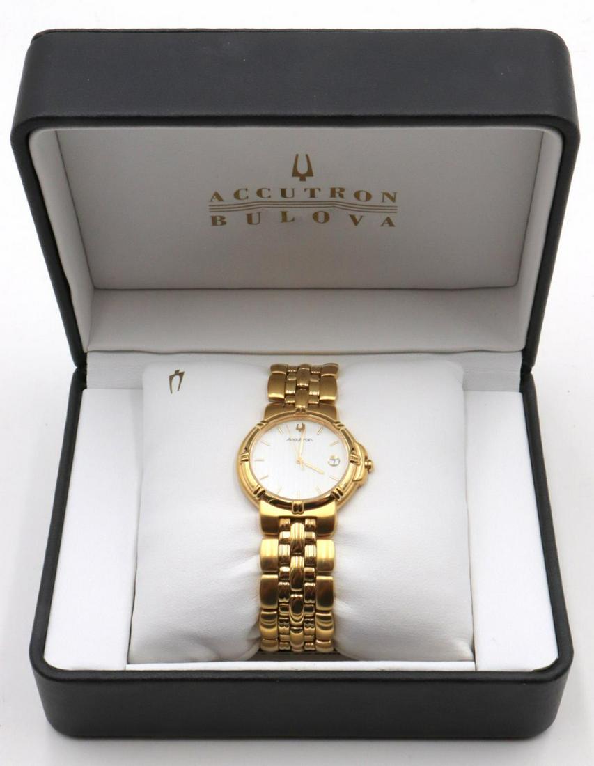 Bulova Accotron Quartz Gold Tone Dress Watch: Bulova Accotron Quartz Gold Tone Dress Watch. 27B23. With inner and outer boxes and papers.