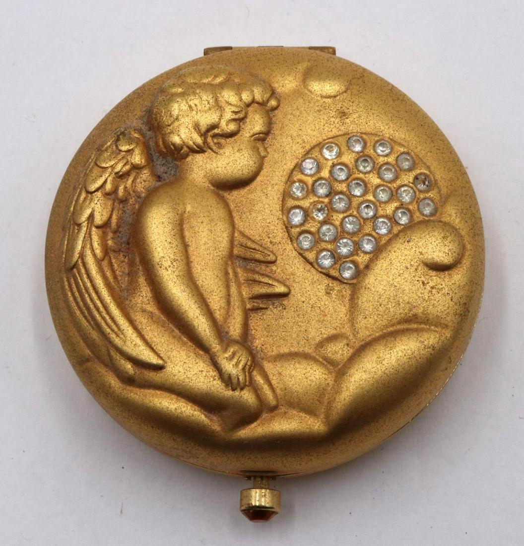 Estee Lauder "Angel of Exploration" Compact: Estee Lauder "Angel of Exploration" Compact. With swarovski crystals. Measures approx. - 2 1/2" x 2 3/8".