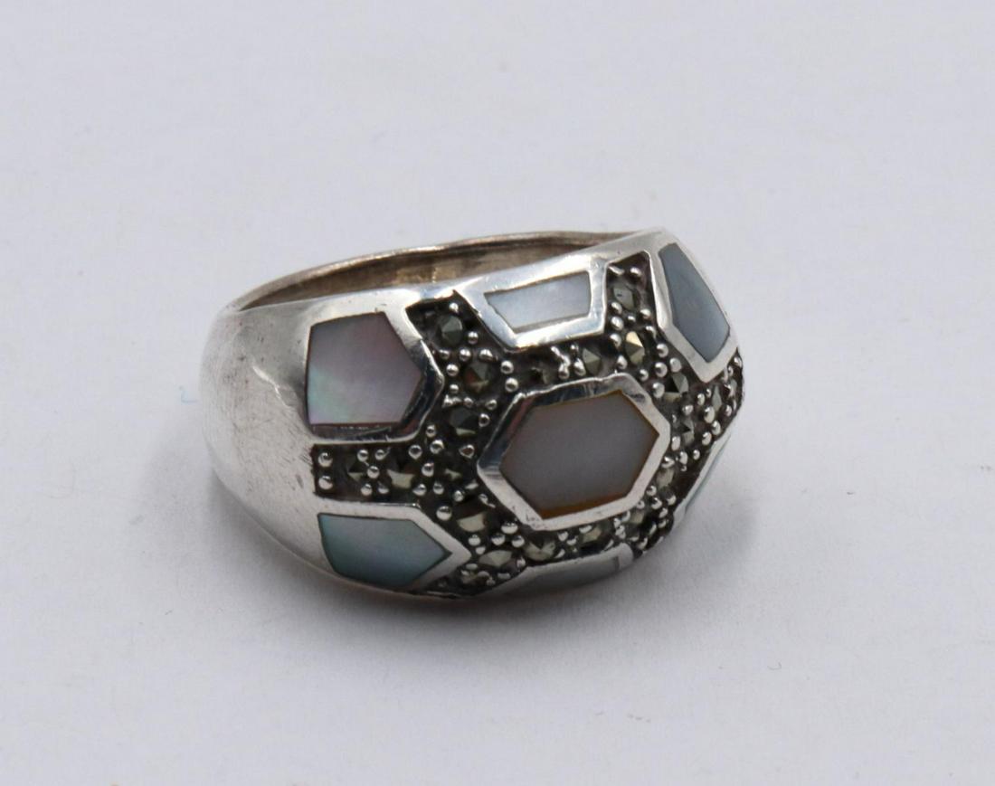 Sterling Marcasite & Mother of Pearl Ring: Sterling Silver Marcasite & Mother of Pearl Ring. Size - 9. Weight - 11.2 grams.