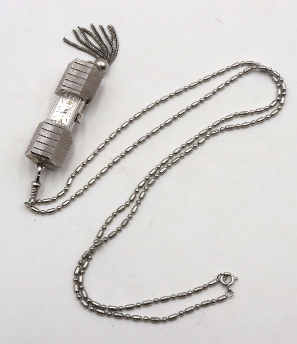 Vintage Bucherer Miniature Clock Necklace: Vintage Bucherer Miniature Clock Necklace. Measures approx. - 30" long.